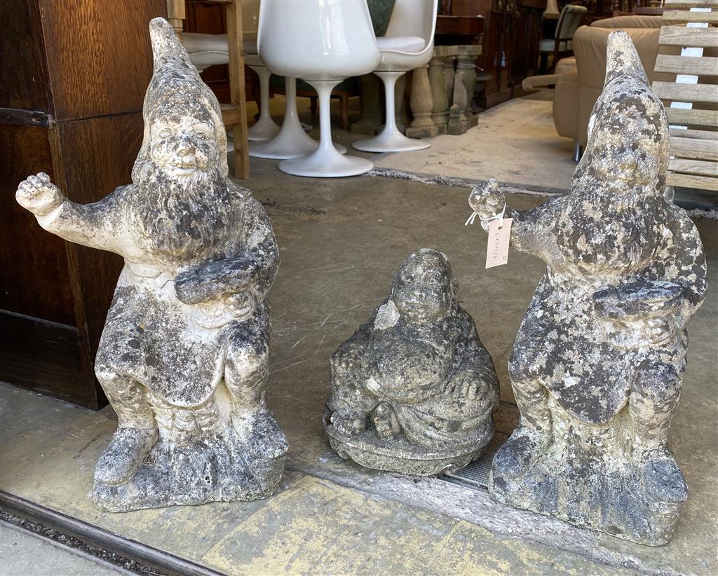 A pair of reconstituted stone garden gnomes, height 62cm together with a seated Buddha
